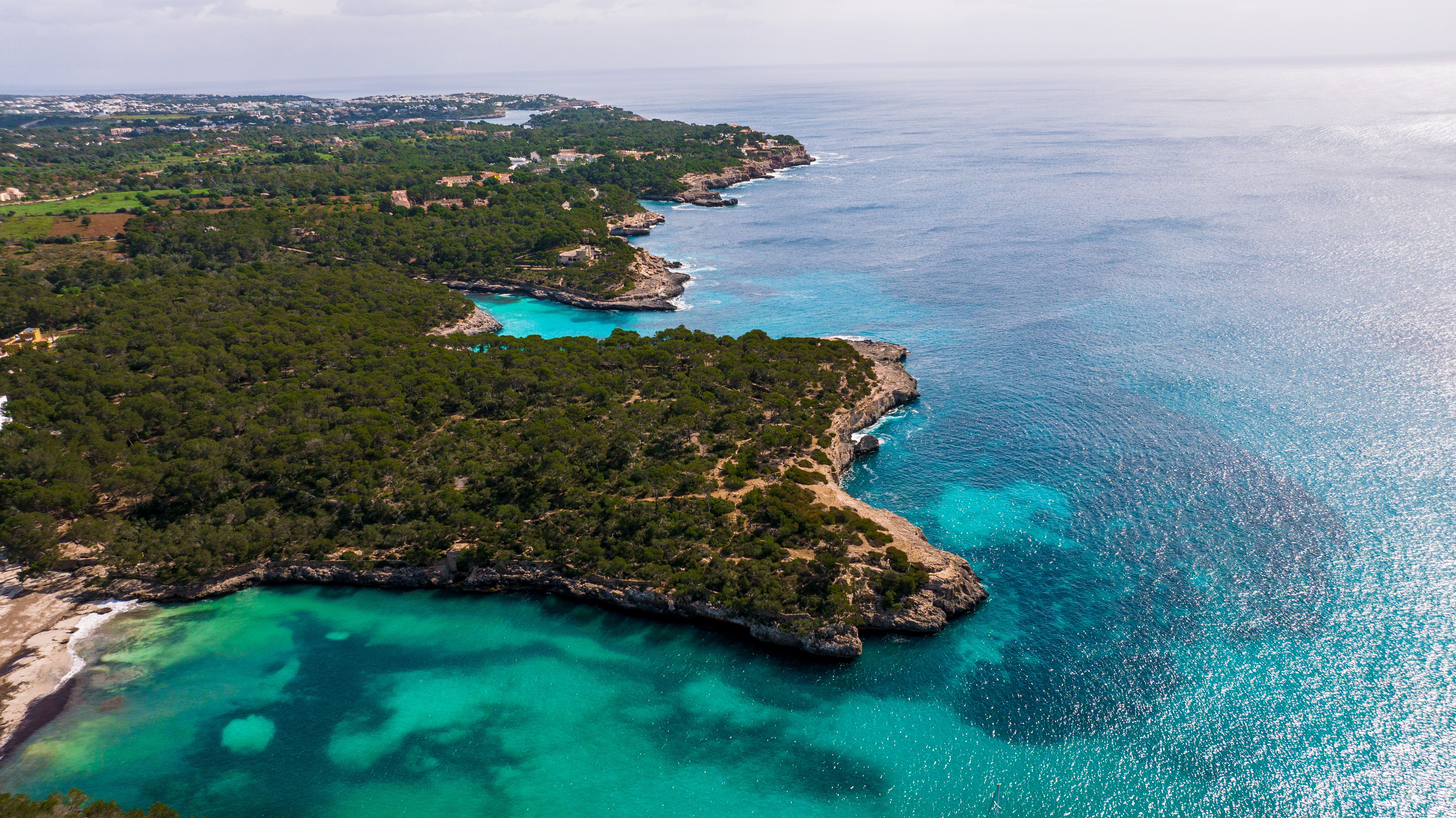 Dramatic limestone coastline and turquoise waters of the Balearic Islands