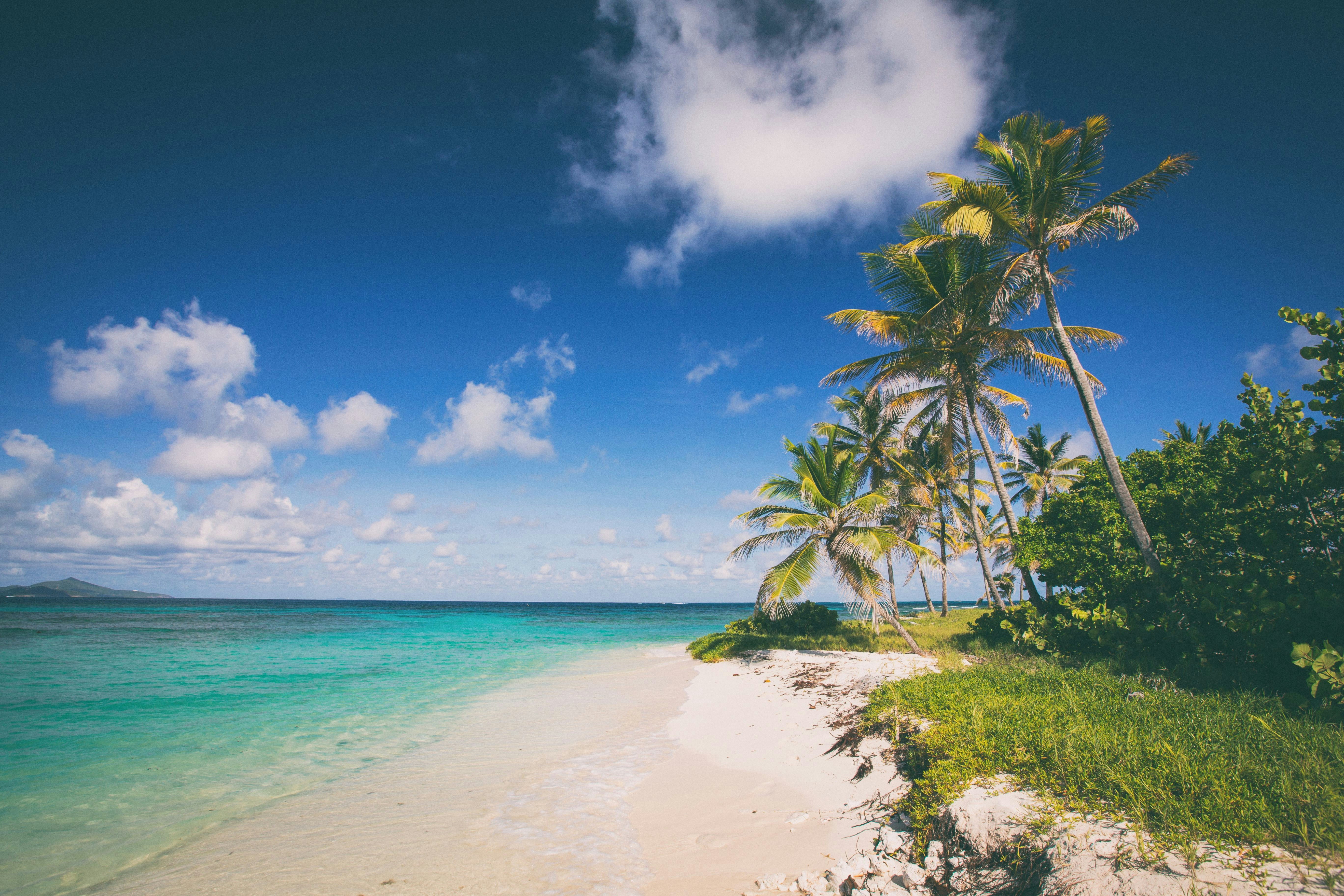 Crystal-clear turquoise waters and lush green islands in the Caribbean