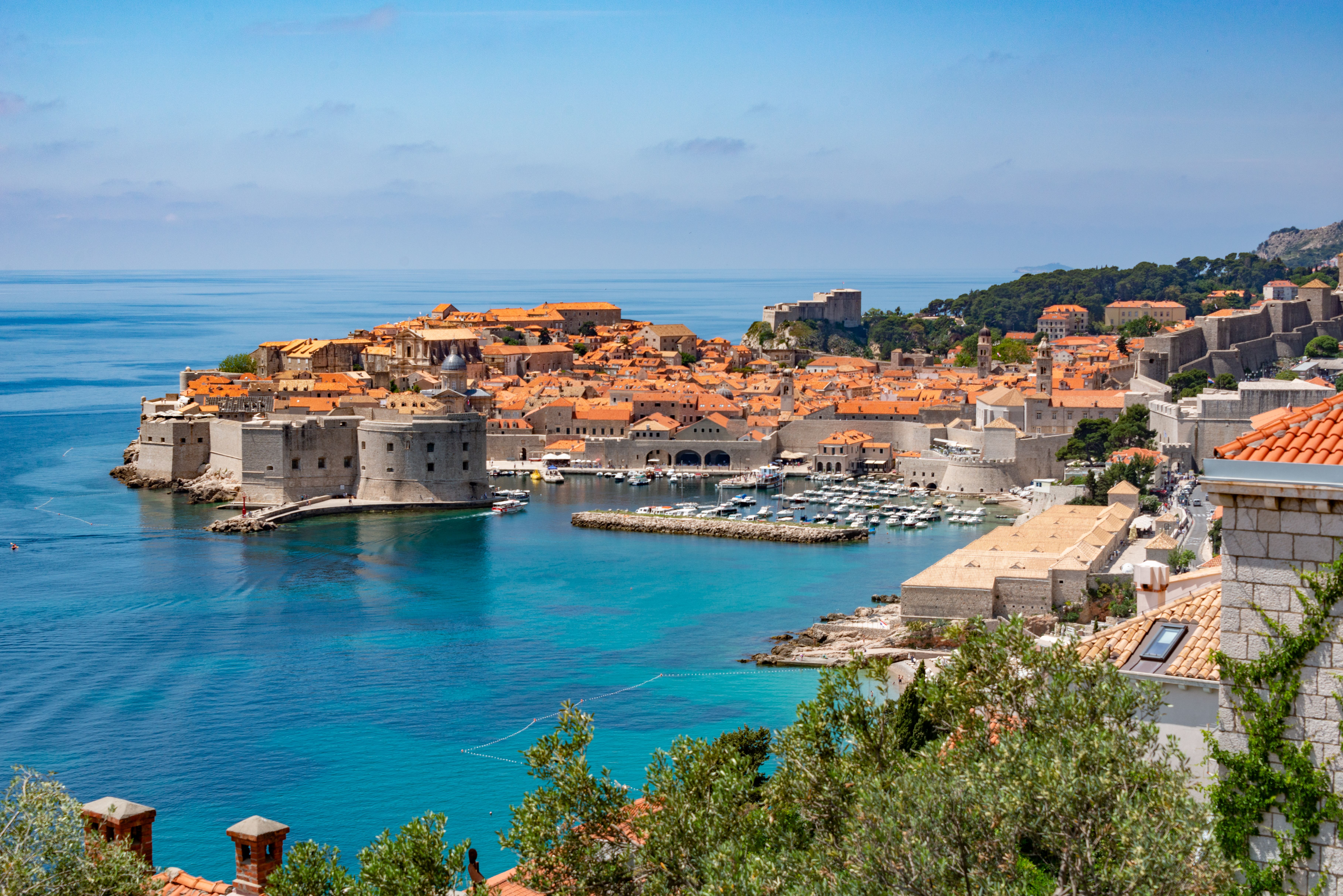 Medieval walled city of Dubrovnik rising from the Adriatic Sea
