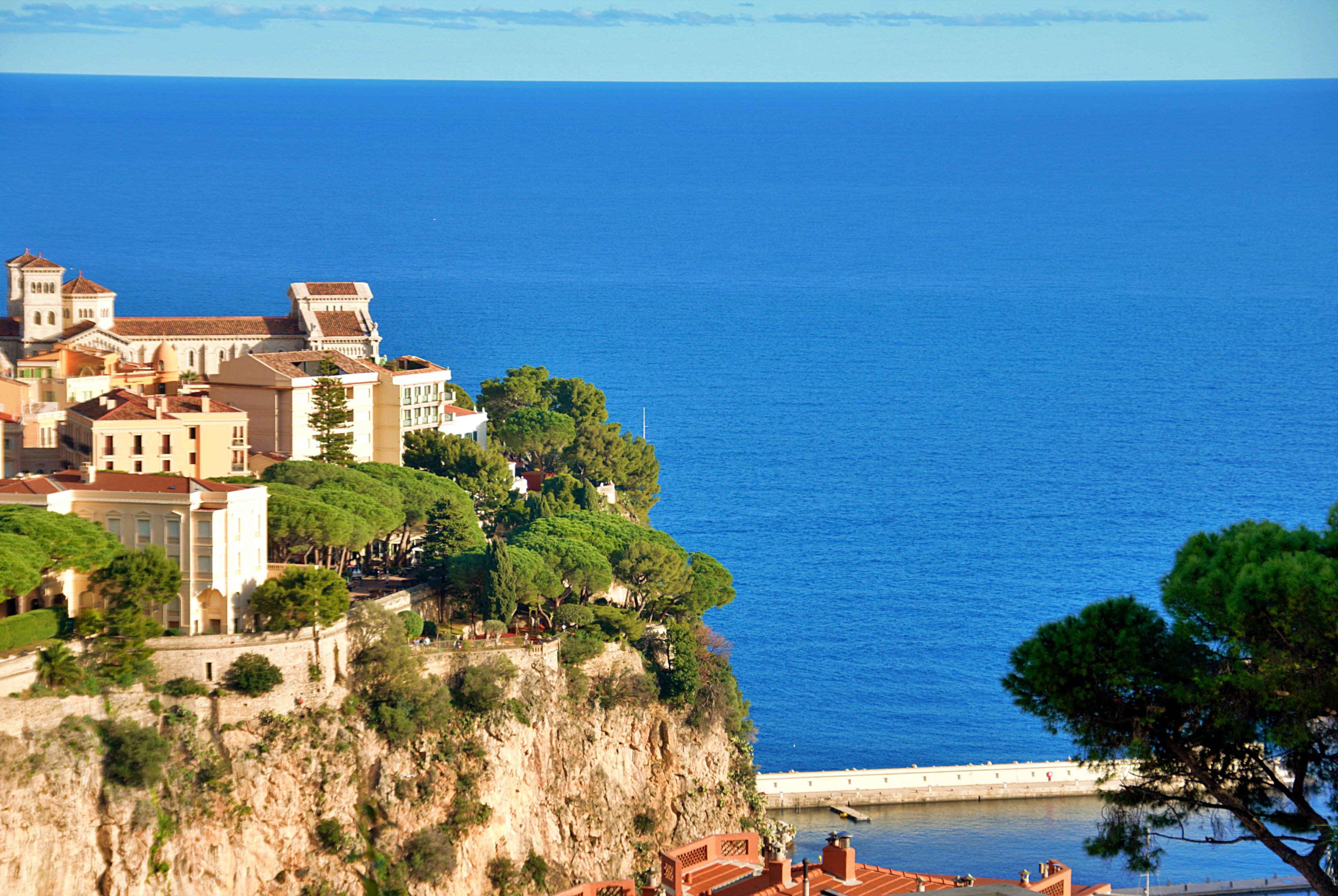 Luxury yachts anchored along the glamorous French Riviera coastline