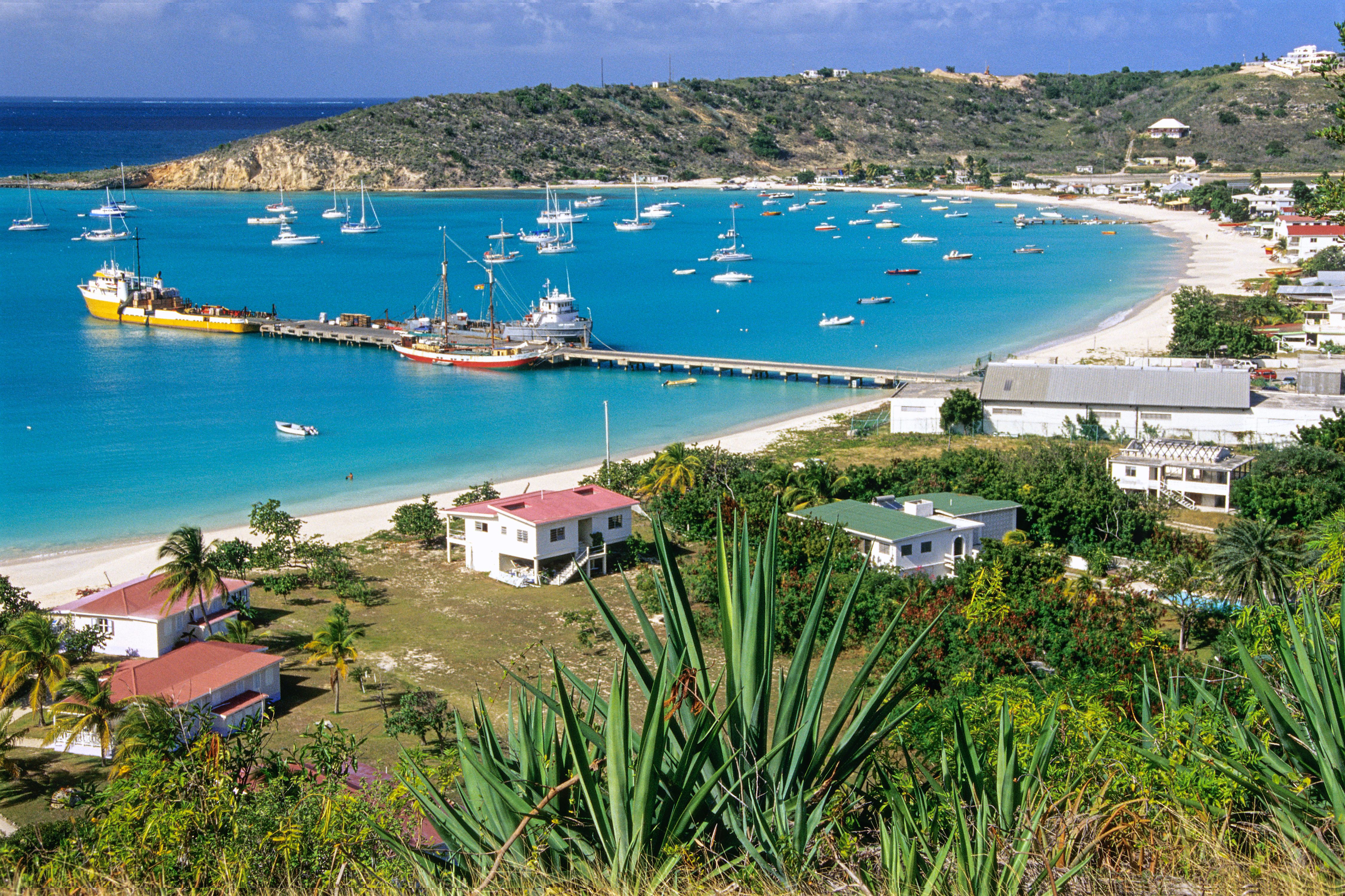 Colorful colonial architecture and turquoise waters of the Leeward Islands